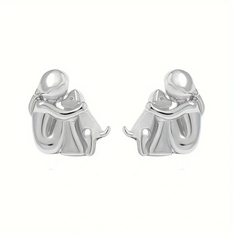 Two-Toned Earrings with a Hug in Silver and Gold in Rosendal