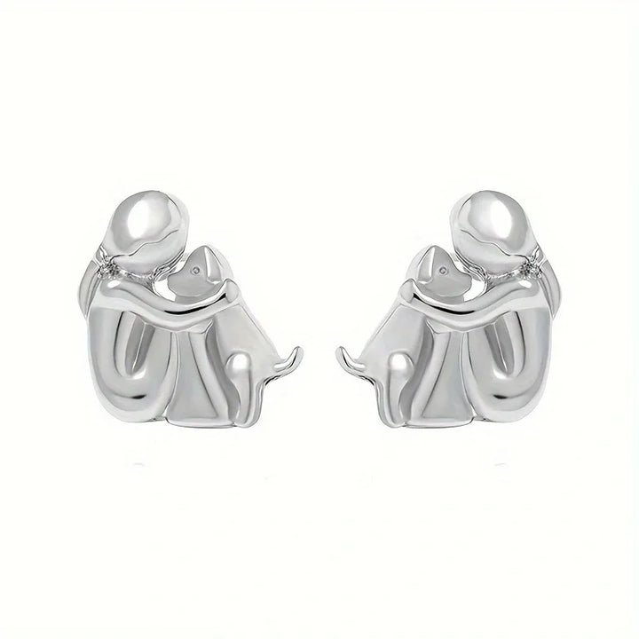 Two-Toned Earrings with a Hug in Silver and Gold in Rosendal
