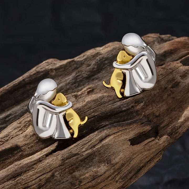 Two-Toned Earrings with a Hug in Silver and Gold in Rosendal