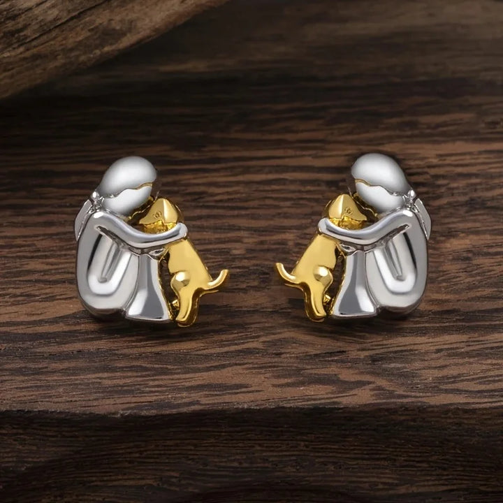 Two-Toned Earrings with a Hug in Silver and Gold in Rosendal